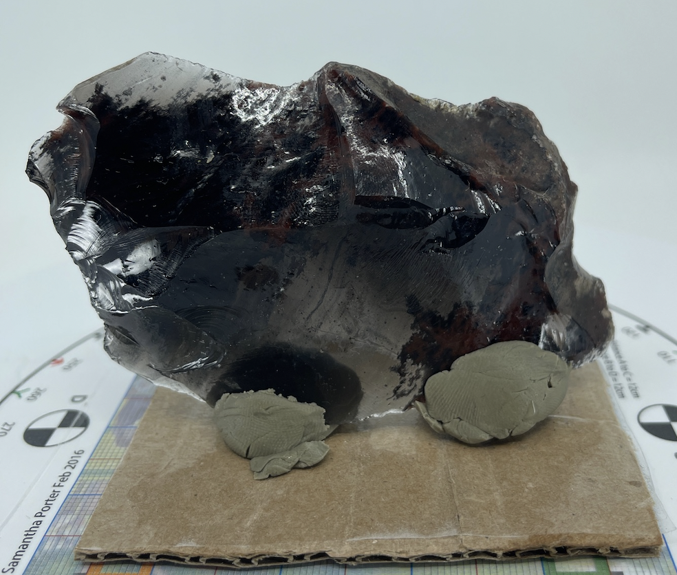 piece of black obsidian ready for digitization